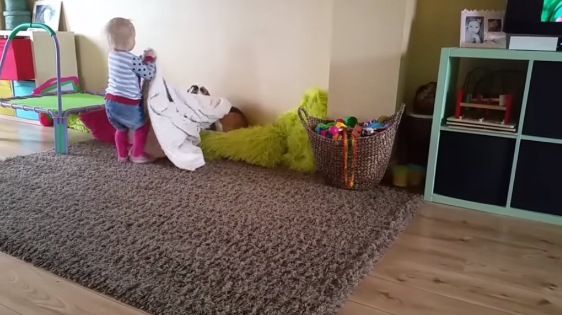 Dog And Baby Tuck Each Other In